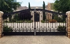 A black iron wrought gate