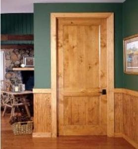 A room with a wooden door