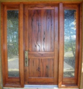 A brown door with mini glass