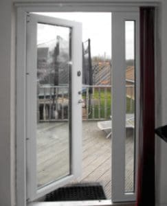 Glass door with white frame