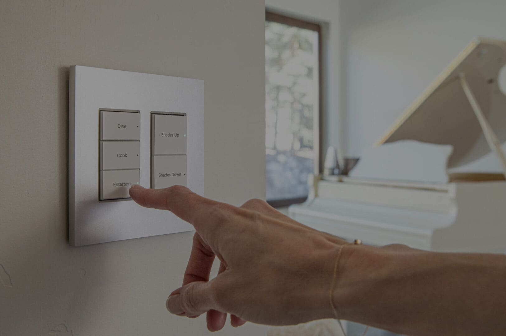 Hand presses smart home control panel.